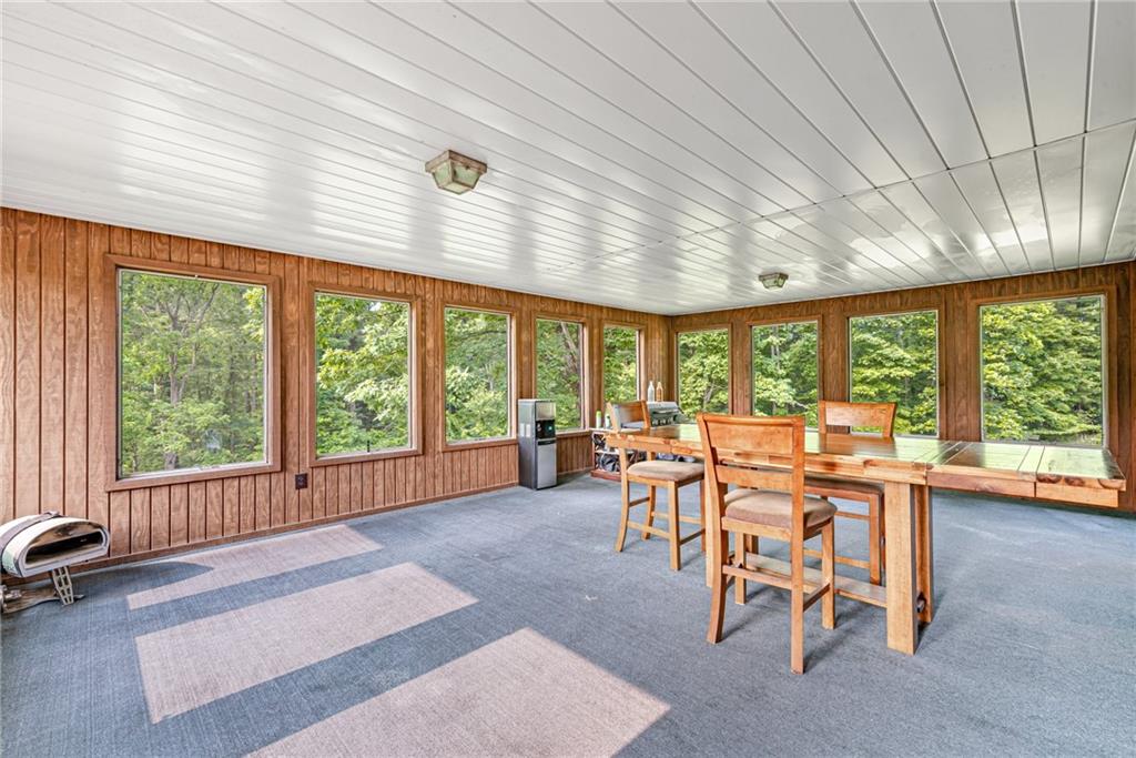 134 Story Road Export, PA 15632 - Photo 15 of 23 a dining room with furniture water view and large windows