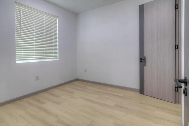 a bathroom with a toilet a sink and bathtub