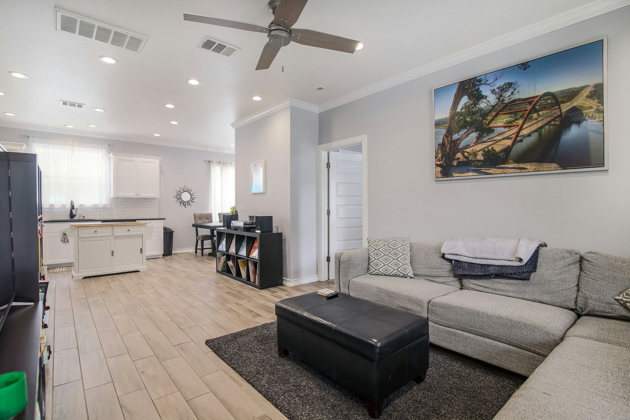 2109 Maxwell Lane, Unit A Austin, TX 78741 - Photo 5 of 27 a living room with furniture and kitchen view