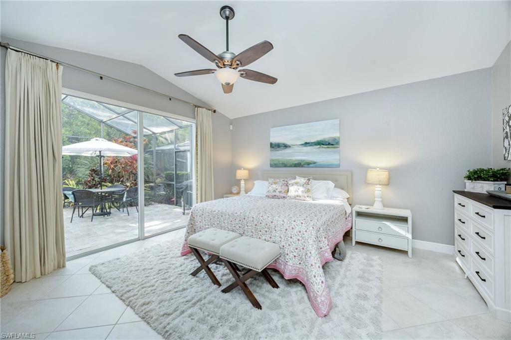 20350 Talon Trace Estero, FL 33928 - Photo 13 of 24 Bedroom with a sunroom, ceiling fan, access to exterior, and light tile patterned flooring