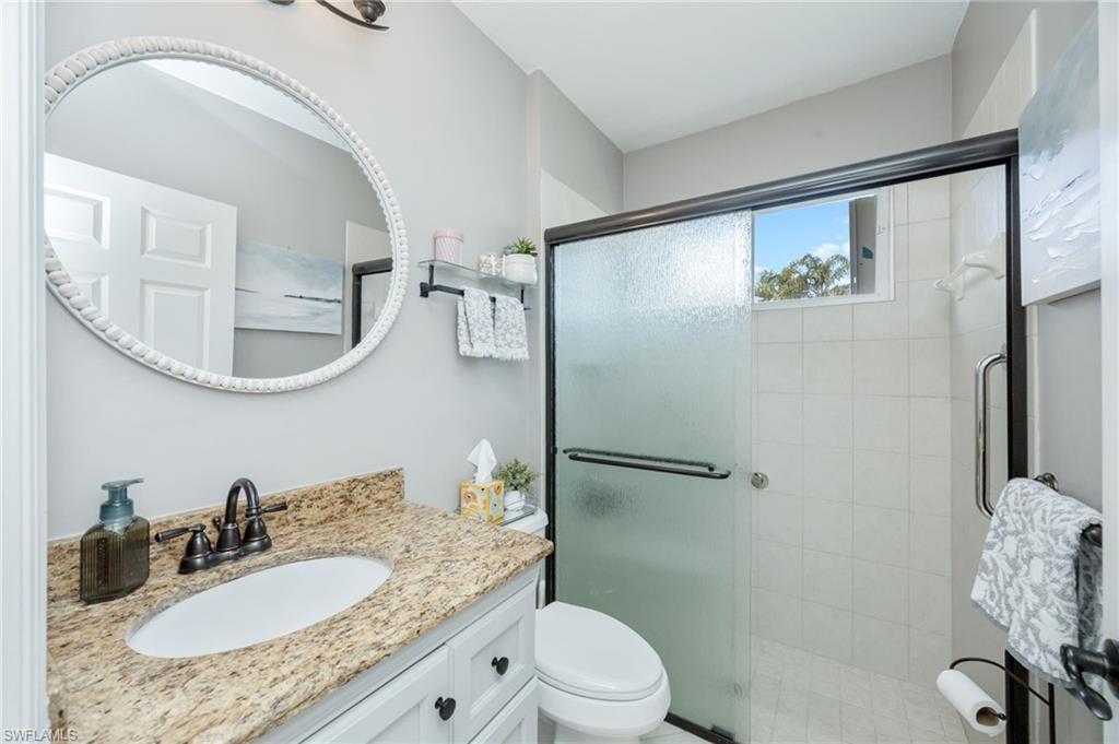 20350 Talon Trace Estero, FL 33928 - Photo 18 of 24 Full bath featuring vanity and a shower stall