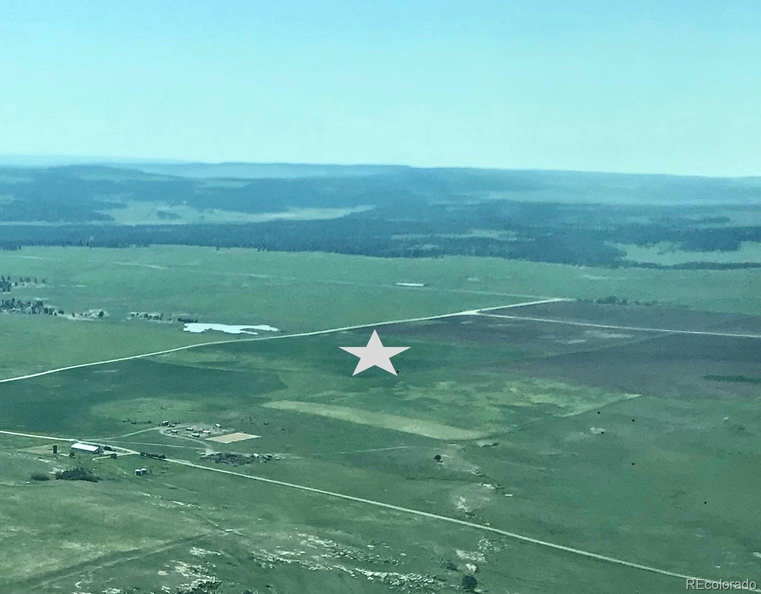 Craven Elbert, CO 80106 - Photo 5 of 5 a view of a golf course with a lake