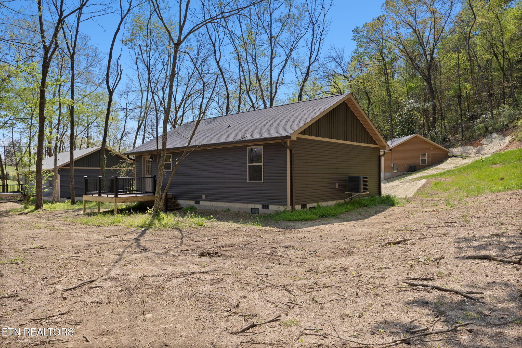 503 Hillcrest Street Clinton, TN 37716 - Photo 16 of 19 a house that has a tree in front of it