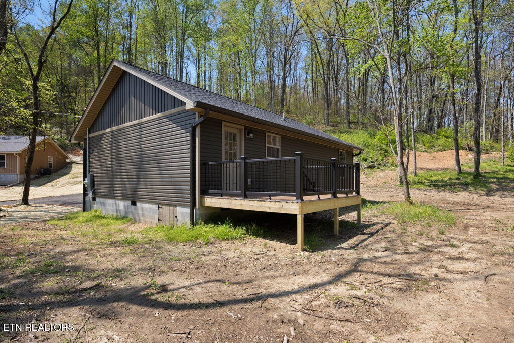 503 Hillcrest Street Clinton, TN 37716 - Photo 17 of 19 a front view of a house with a yard