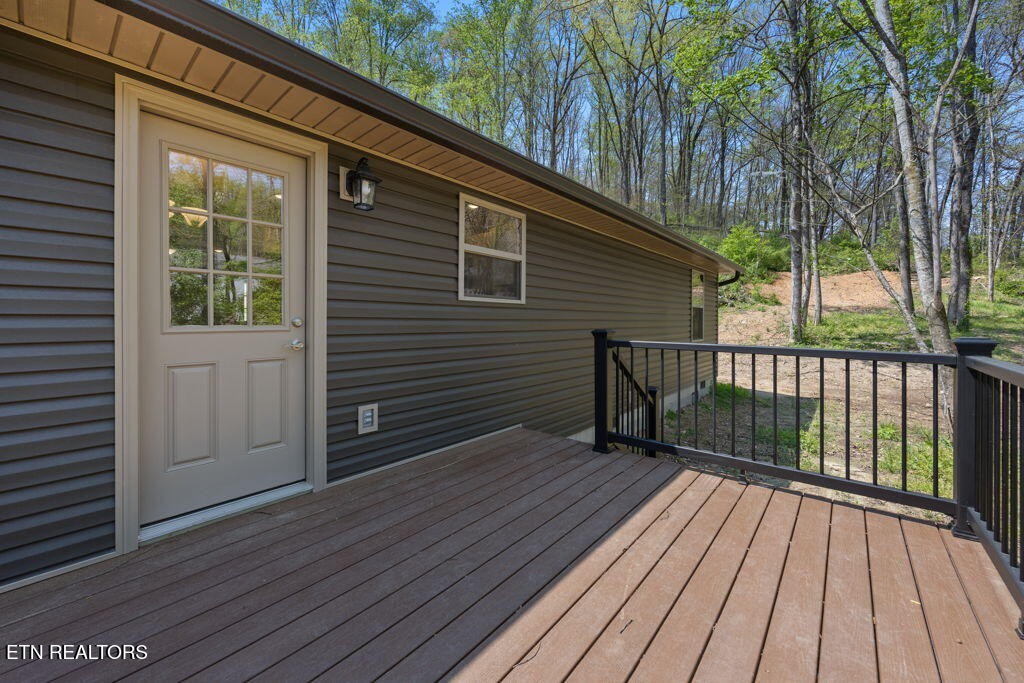 503 Hillcrest Street Clinton, TN 37716 - Photo 19 of 19 a view of backyard with a deck