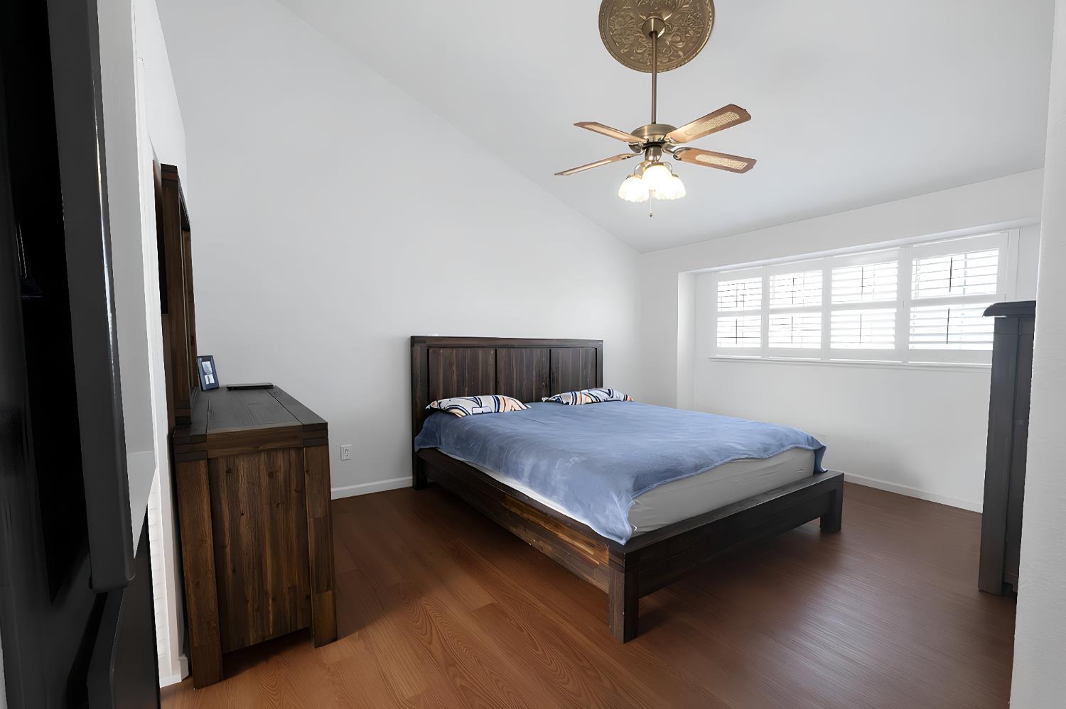 1815 East Frederick Avenue Fresno, CA 93720 - Photo 21 of 23 a bedroom with a bed and window