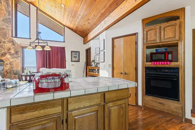 a dining room with furniture and a window
