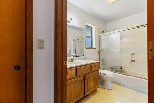 a view of an swimming pool with a yard