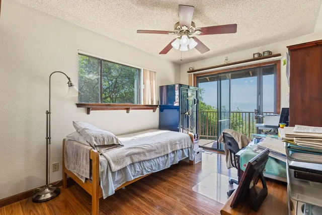 a backyard of a house with lots of green space