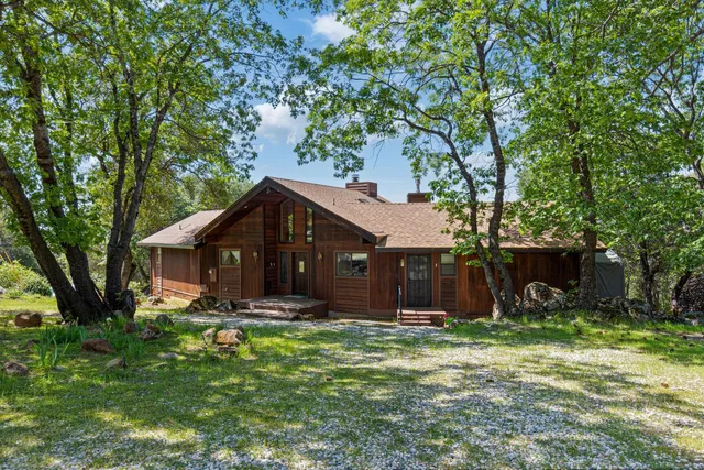 a view of living room with furniture and a couch