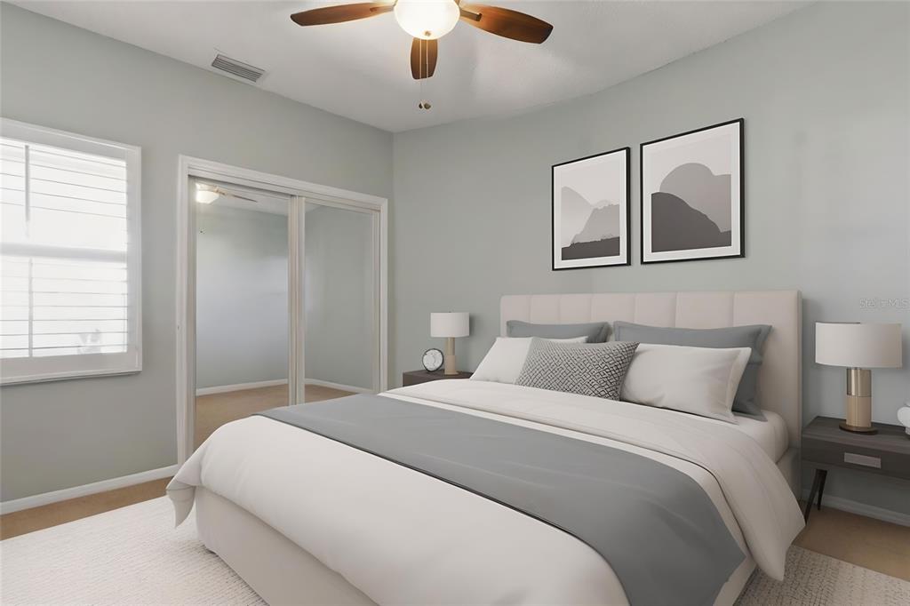 5567 Sea Forest Drive, Unit 323 New Port Richey, FL 34652 - Photo 22 of 37 a bedroom with a bed and a painting on the wall