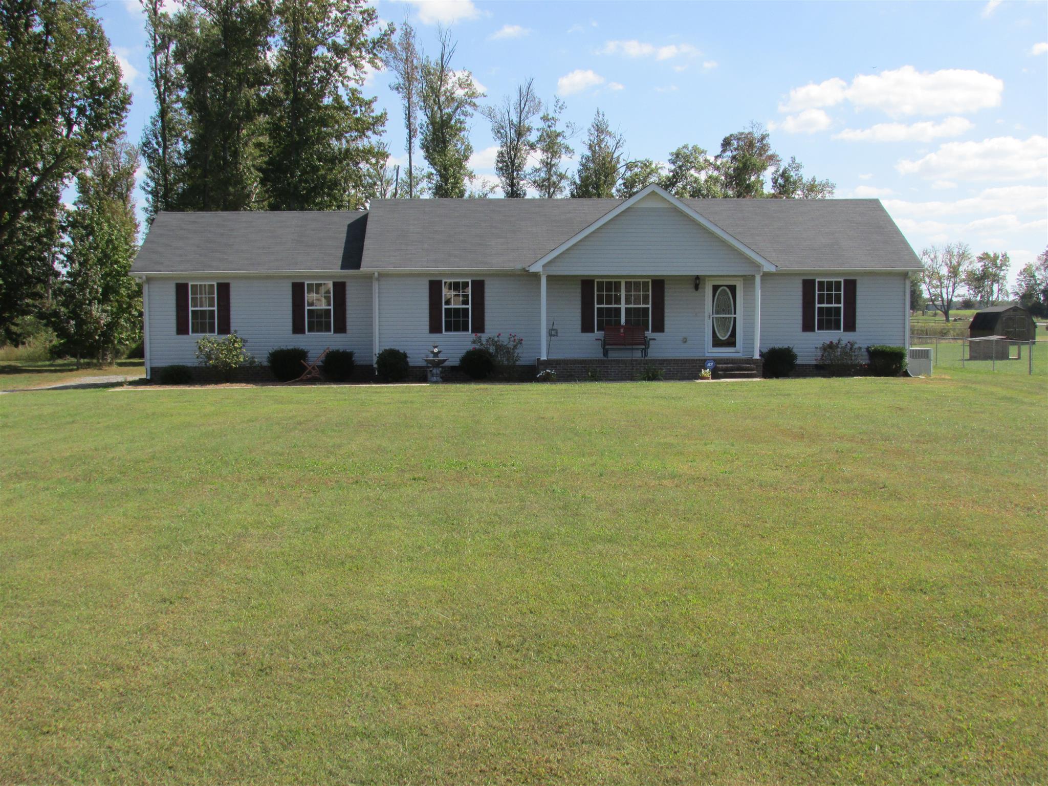94 Ferrells Loop Road Manchester, TN 37355 - Photo 1 of 17 a front view of a house with yard