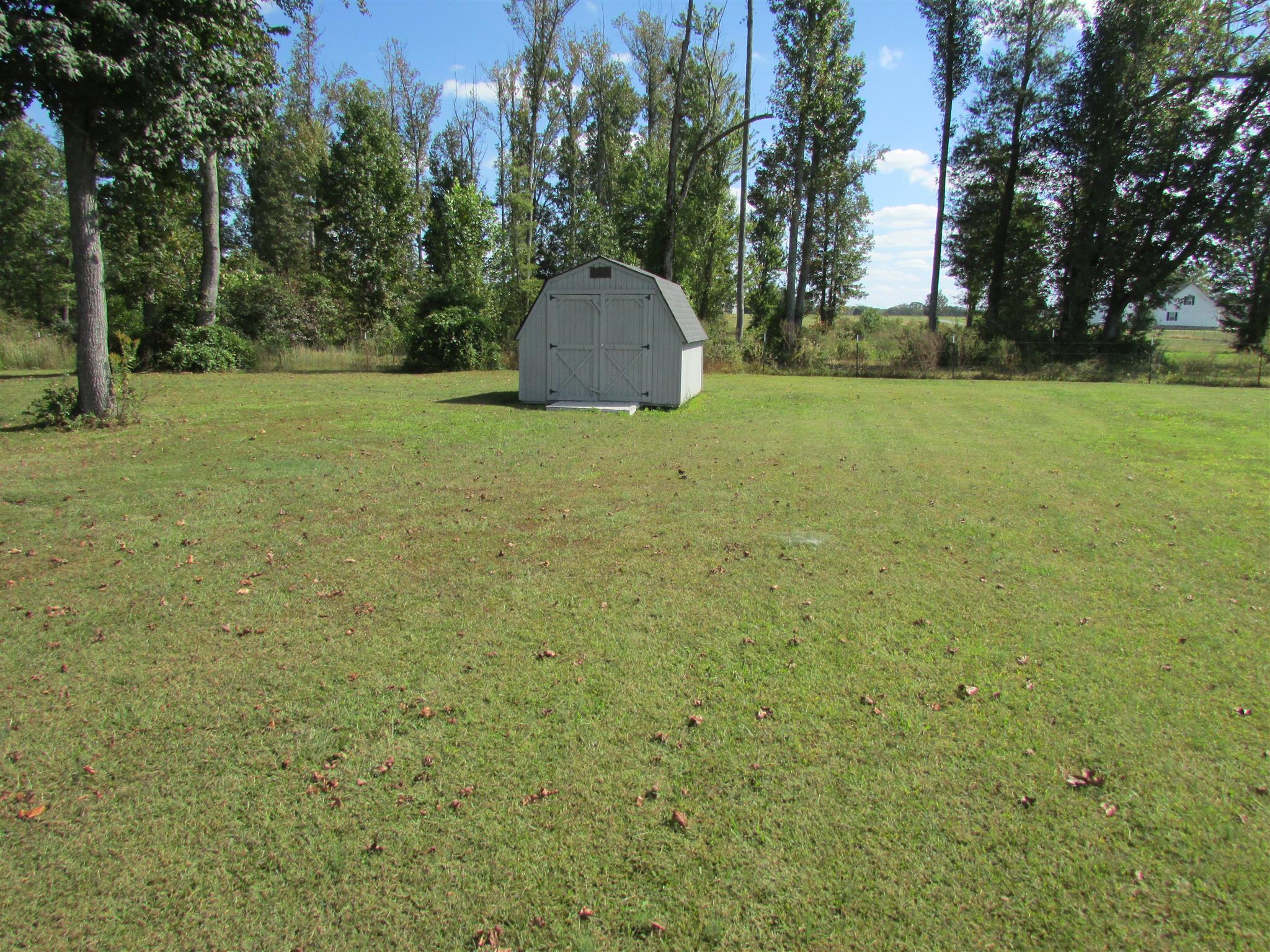 94 Ferrells Loop Road Manchester, TN 37355 - Photo 17 of 17 a view of a field with trees
