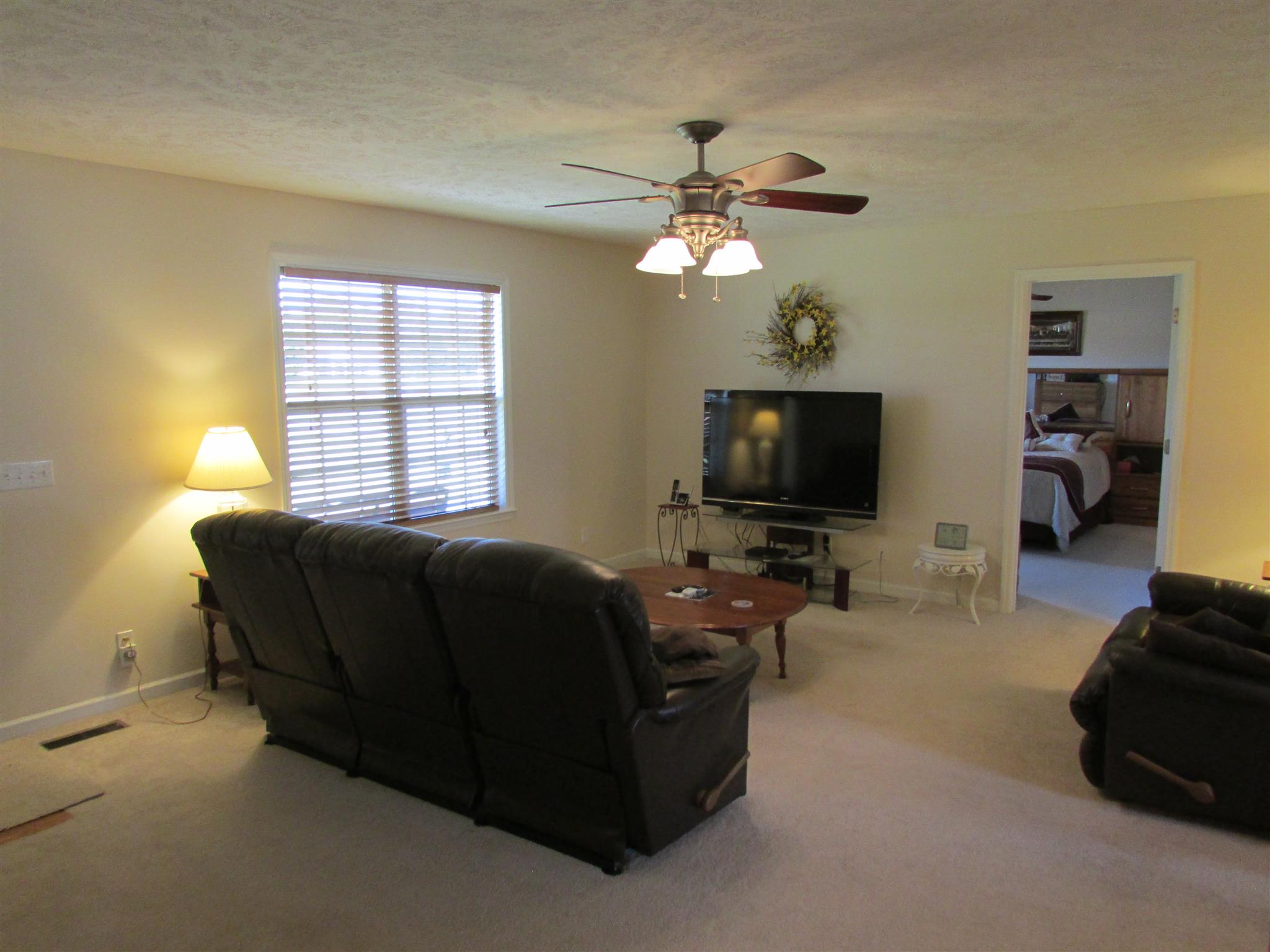 94 Ferrells Loop Road Manchester, TN 37355 - Photo 3 of 17 a living room with furniture and a flat screen tv