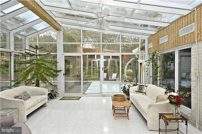 11505 Big Piney Way Potomac, MD 20854 - Photo 11 of 29 a living room with furniture and a large window