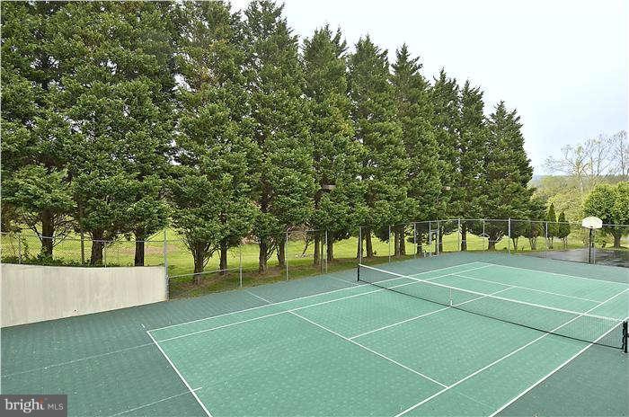 11505 Big Piney Way Potomac, MD 20854 - Photo 26 of 29 a view of an outdoor space and tennis court