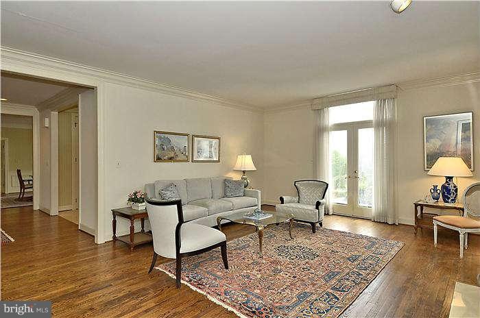 11505 Big Piney Way Potomac, MD 20854 - Photo 4 of 29 a living room with furniture and a rug