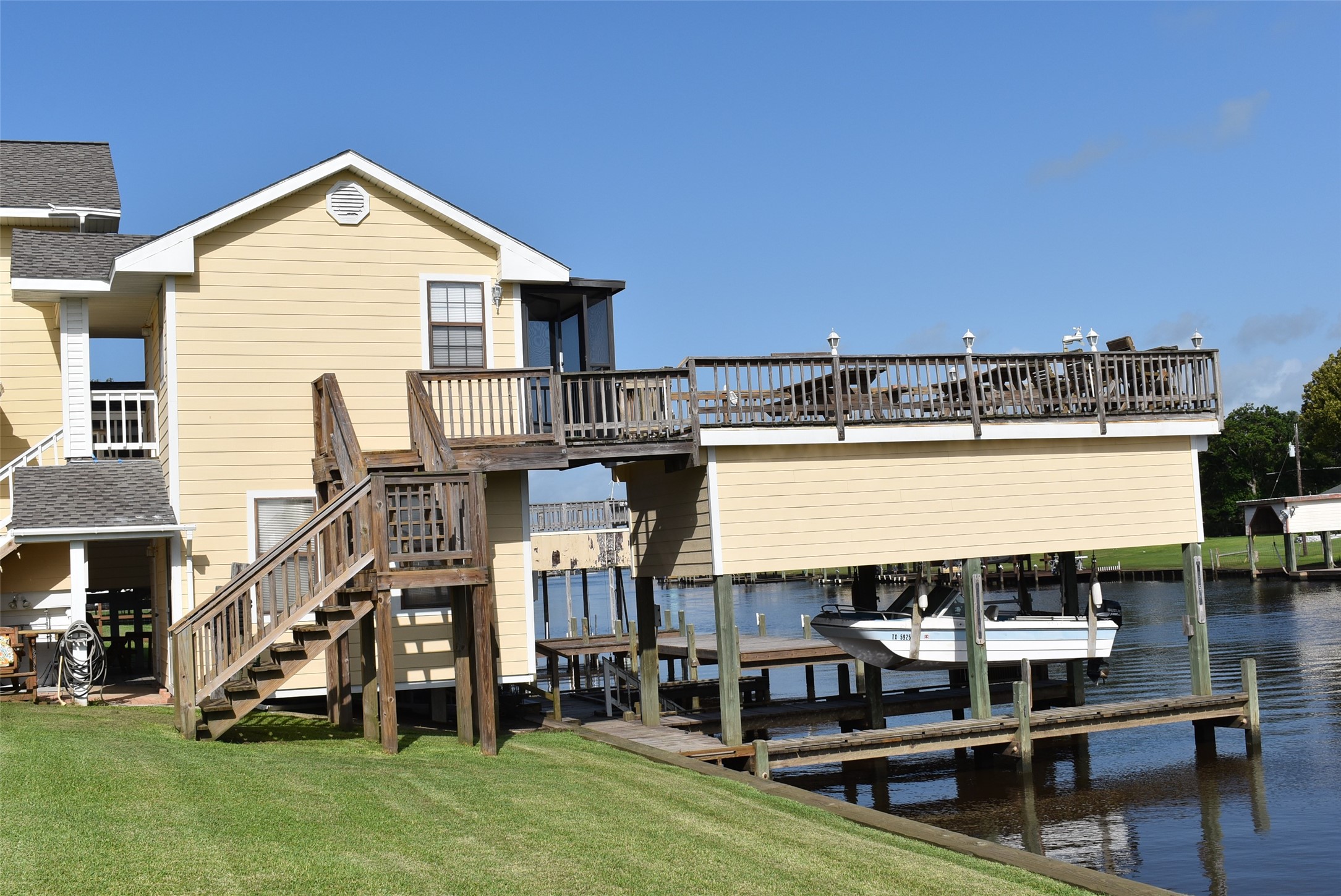 1657 County Road Sargent, TX 77414 - Photo 8 of 46 Separate stairs can lead straight up to the boat house deck
