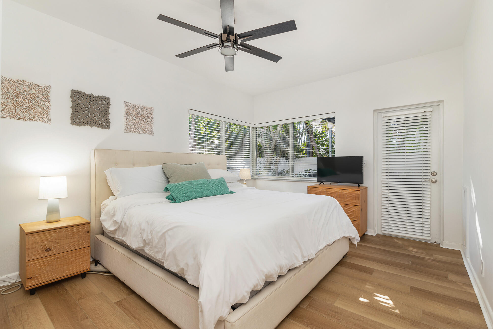 248 Cortez Road West Palm Beach, FL 33405 - Photo 12 of 27 a large bedroom with a bed and a dresser