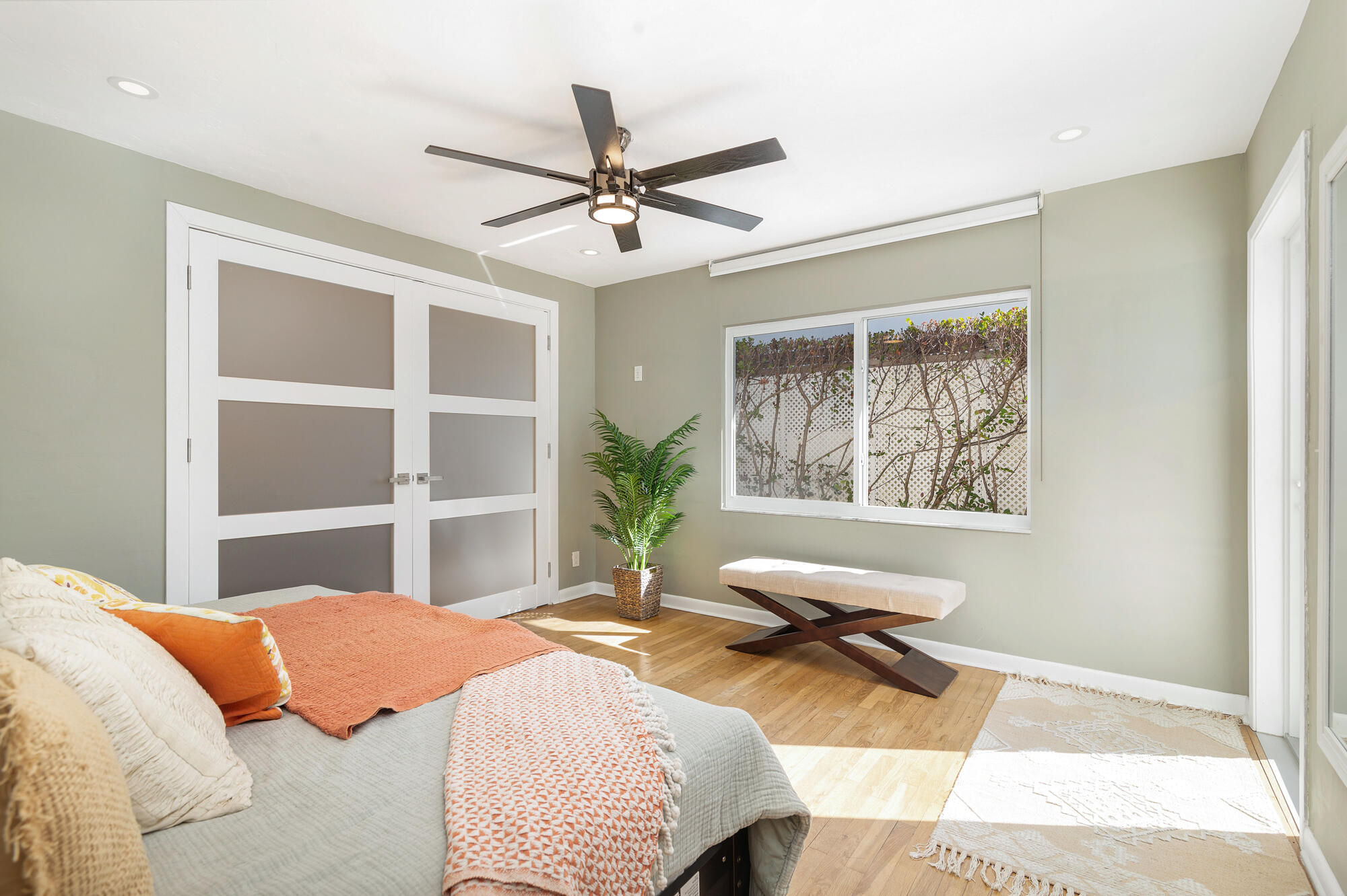 248 Cortez Road West Palm Beach, FL 33405 - Photo 16 of 27 a bedroom with a bed and a large window