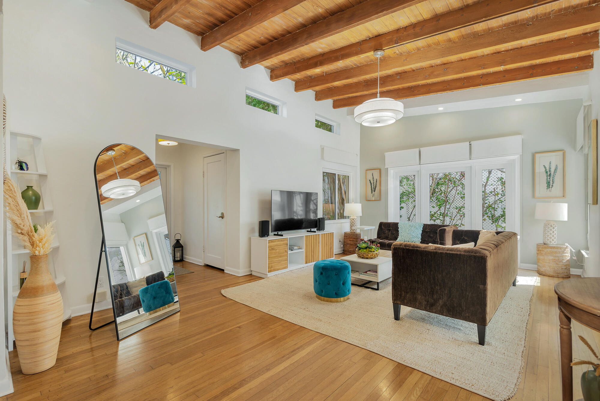 248 Cortez Road West Palm Beach, FL 33405 - Photo 2 of 27 a living room with furniture and a flat screen tv