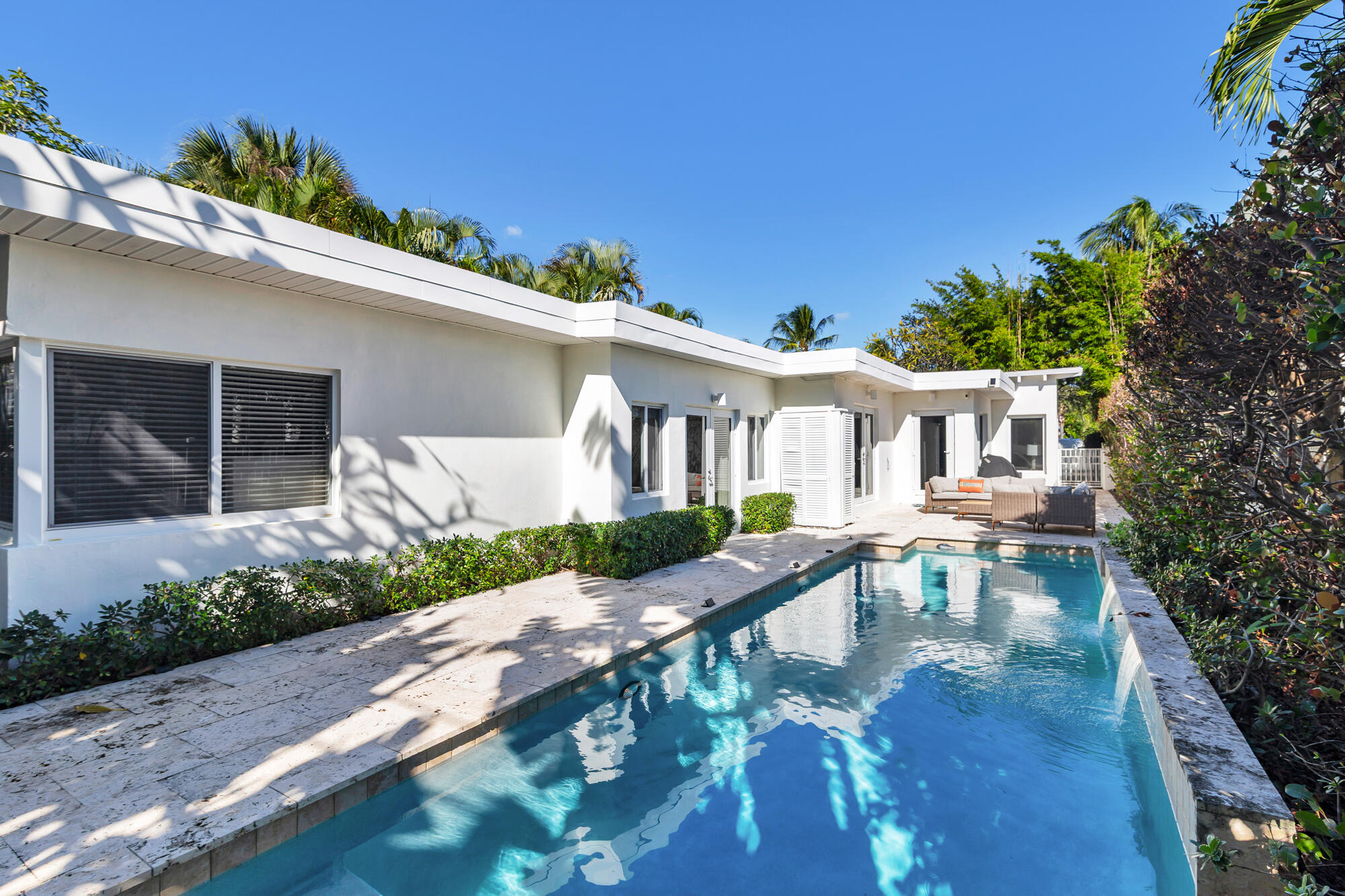 248 Cortez Road West Palm Beach, FL 33405 - Photo 22 of 27 a front view of a house with garden