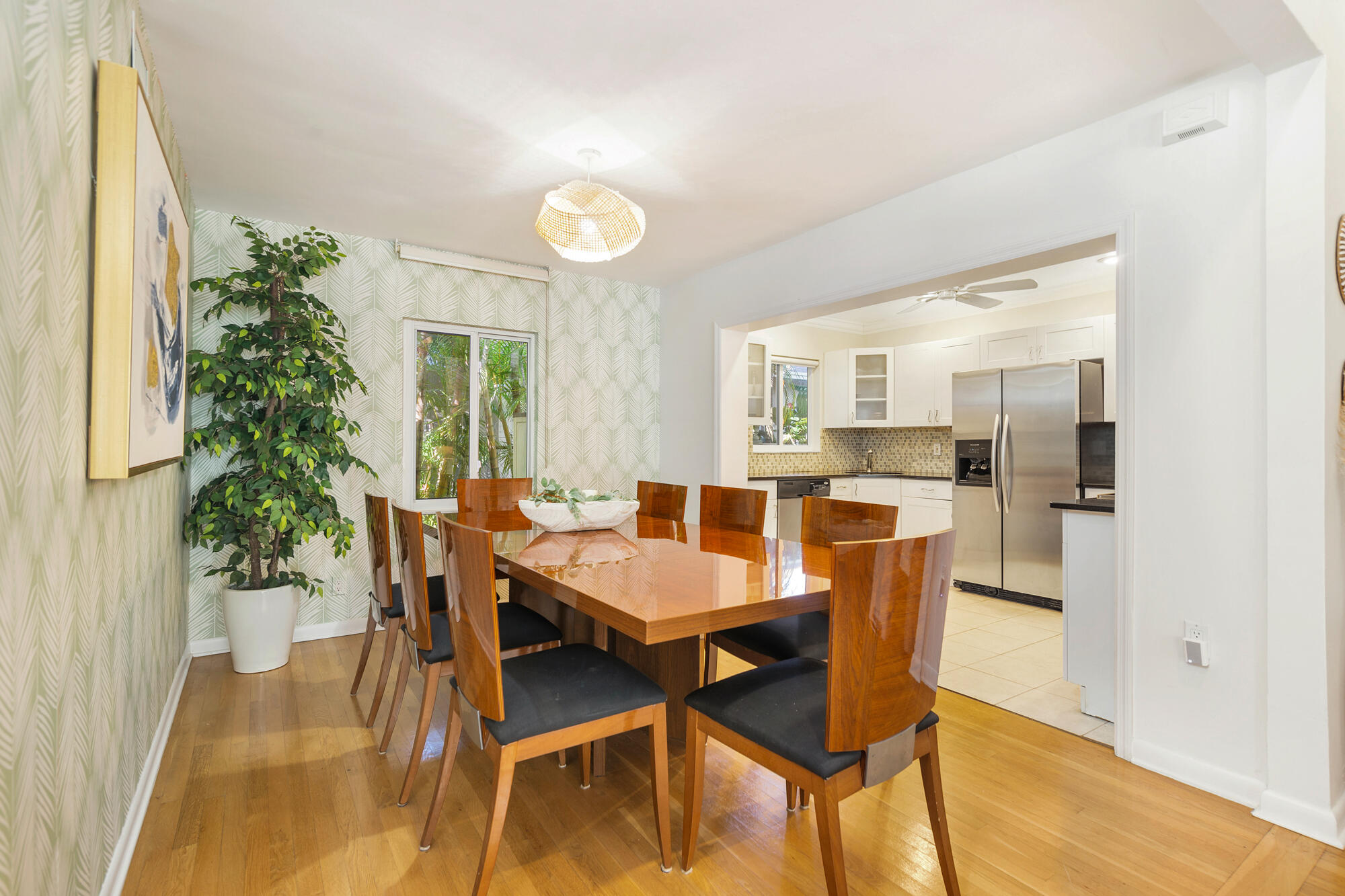 248 Cortez Road West Palm Beach, FL 33405 - Photo 6 of 27 a view of a dining room with furniture and wooden floor