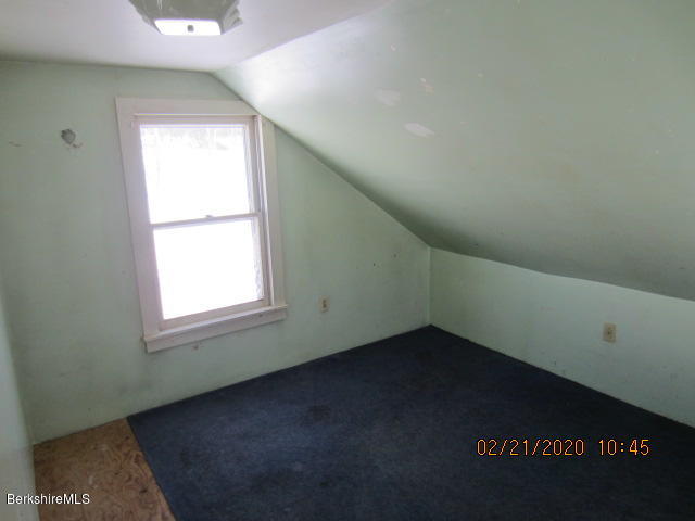 37 Central Shaft Road Florida, MA 01247 - Photo 3 of 11 a view of an empty room with a window