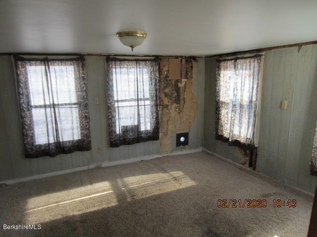 37 Central Shaft Road Florida, MA 01247 - Photo 4 of 11 a view of an empty room with a window