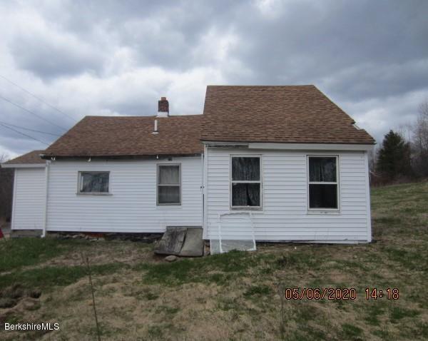 37 Central Shaft Road Florida, MA 01247 - Photo 8 of 11 a front view of a house with a garden