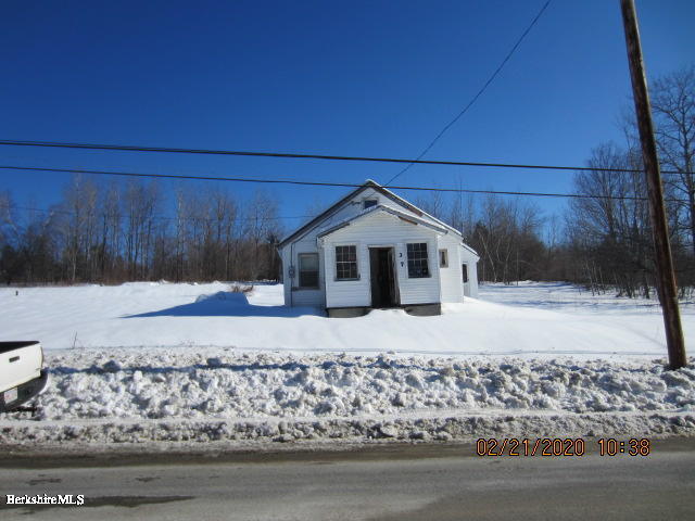 37 Central Shaft Road Florida, MA 01247 - Photo 10 of 11 a front view of a house with a yard