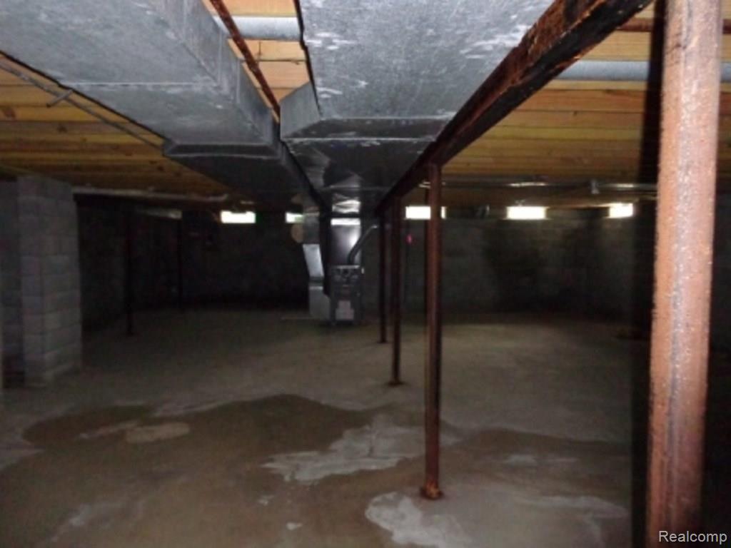 23600 Hall Road Trenton, MI 48183 - Photo 27 of 28 27-Basement View 1.jpg