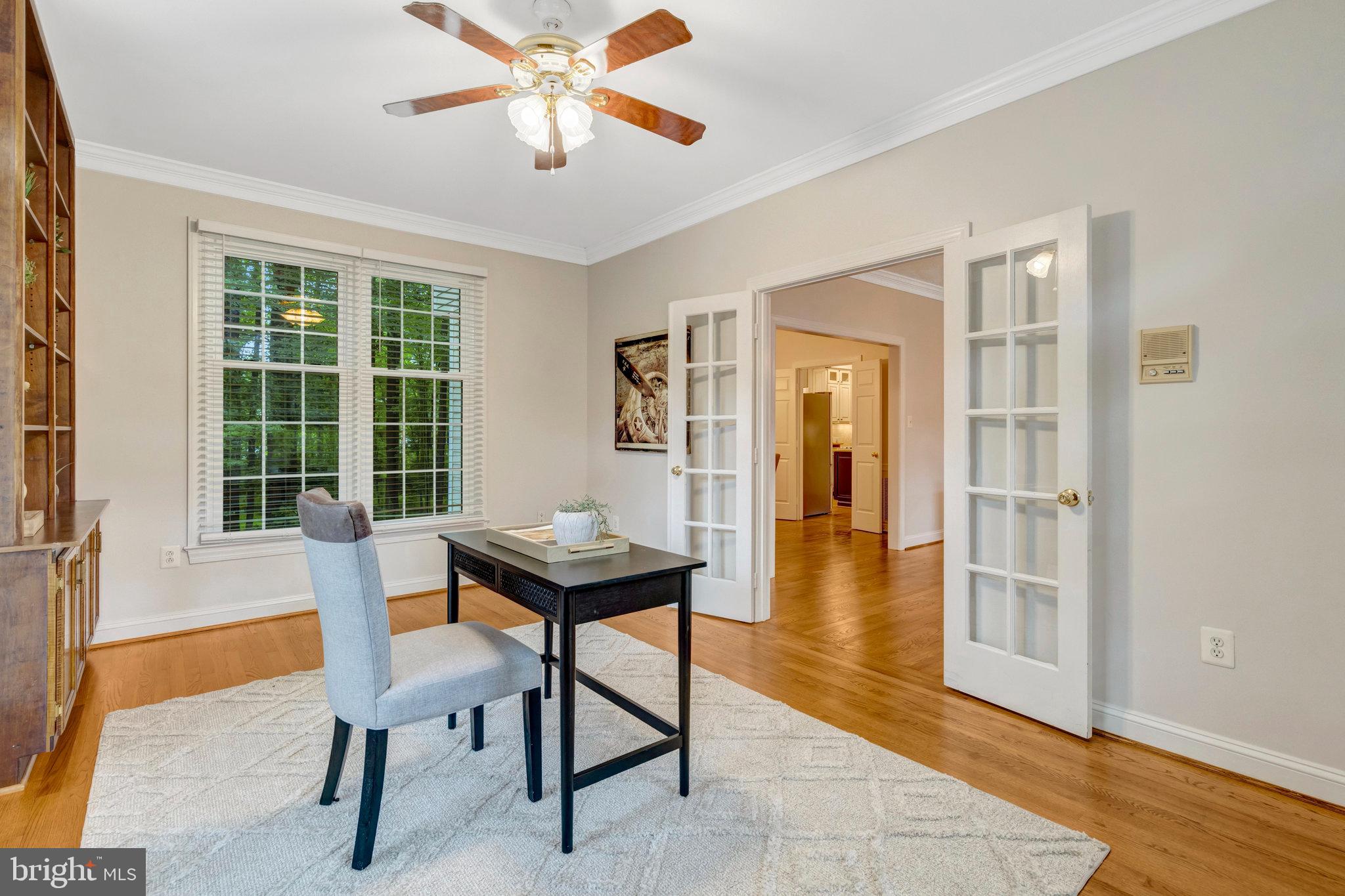 11181 Longwood Grove Drive Reston, VA 20194 - Photo 12 of 94 a view of a livingroom with furniture and wooden floor