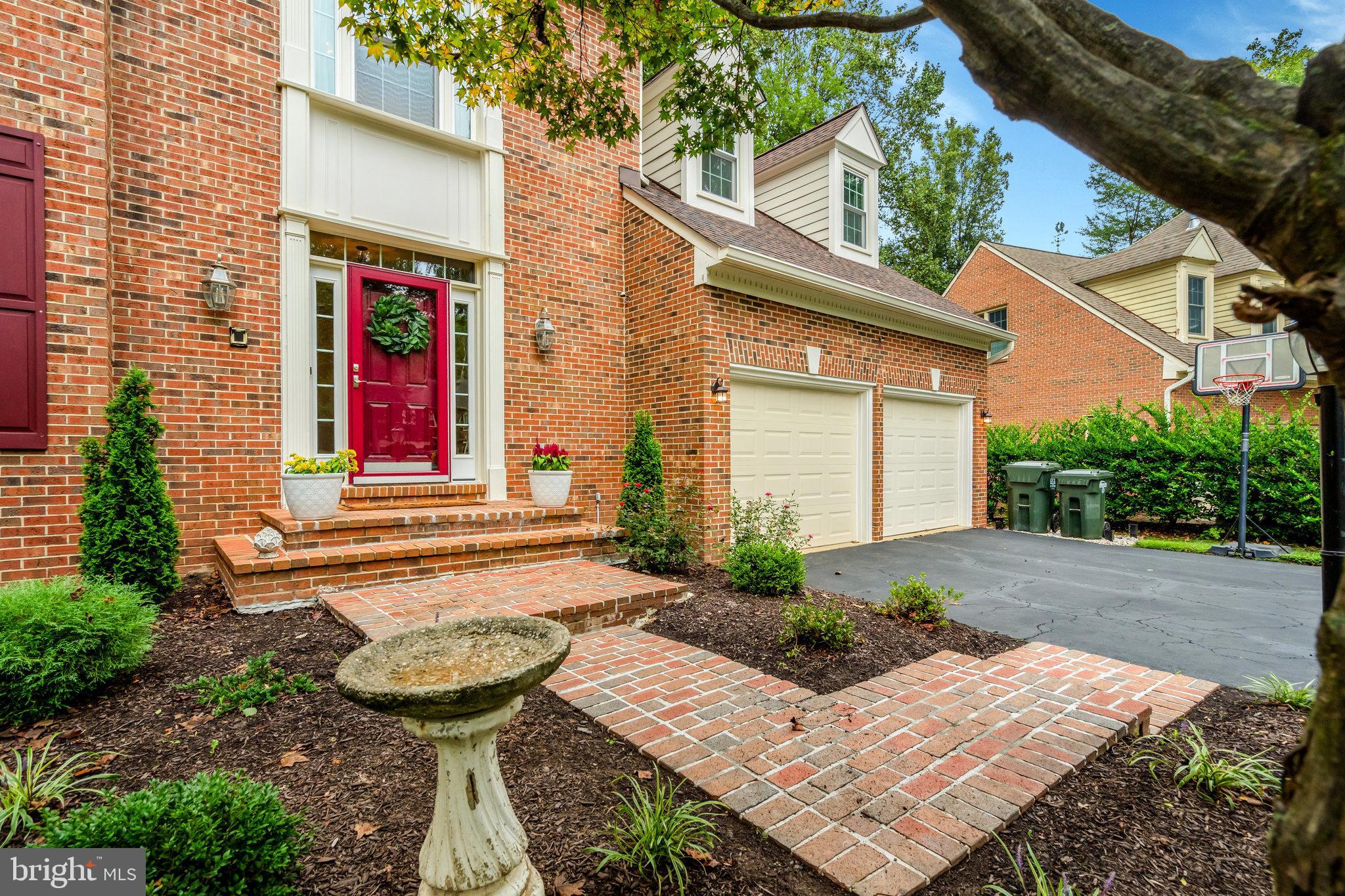 11181 Longwood Grove Drive Reston, VA 20194 - Photo 2 of 94 a view of a house with backyard and sitting area
