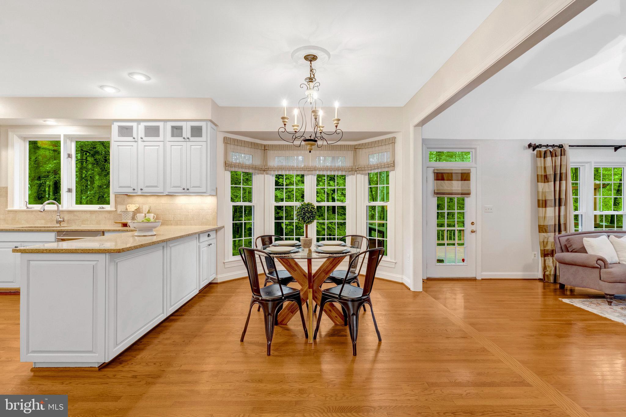 11181 Longwood Grove Drive Reston, VA 20194 - Photo 22 of 94 a view of a dining room with furniture window and outside view
