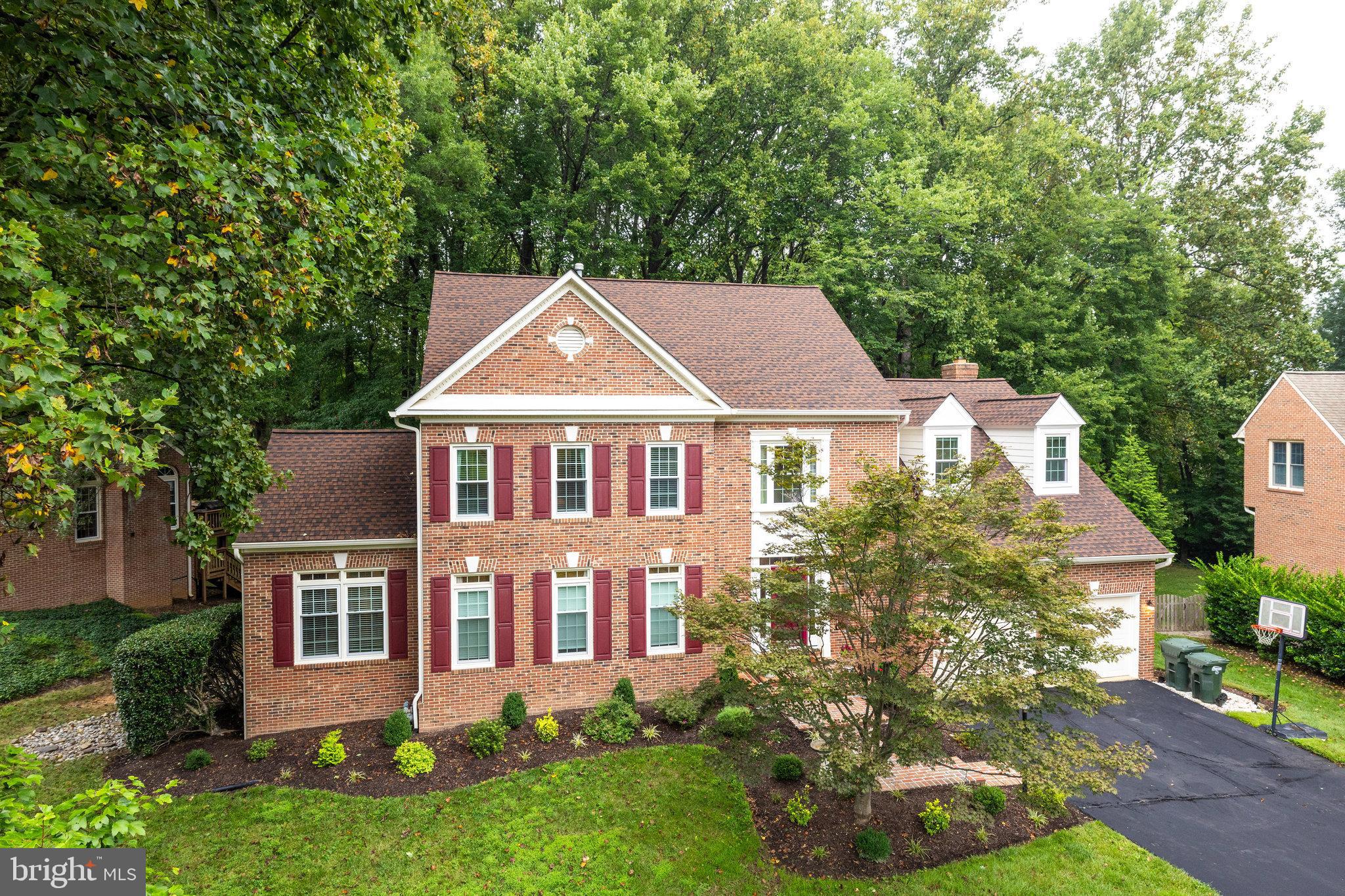 11181 Longwood Grove Drive Reston, VA 20194 - Photo 3 of 94 Charming brick home nestled among trees