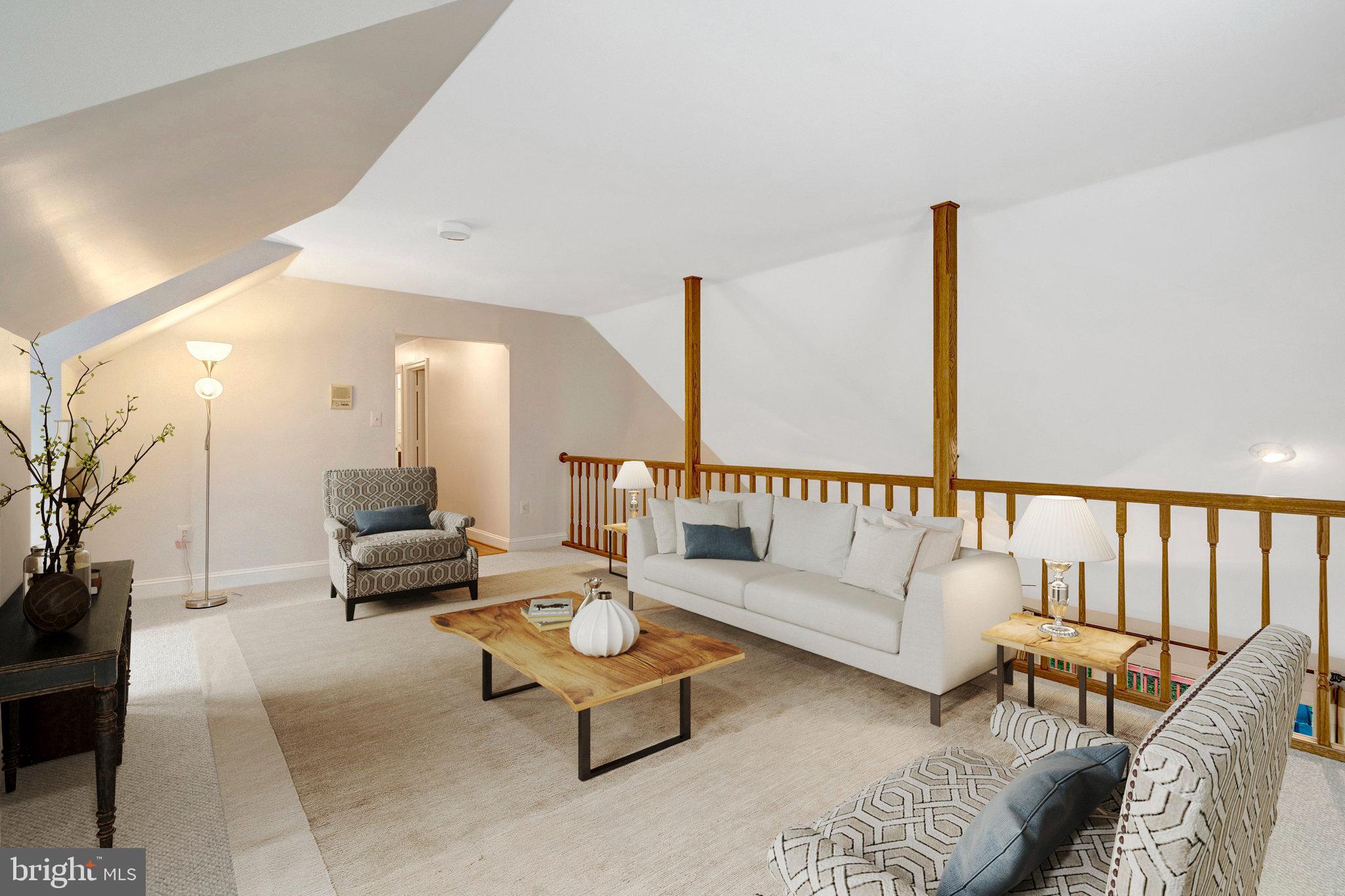11181 Longwood Grove Drive Reston, VA 20194 - Photo 32 of 94 a living room with furniture and a potted plant