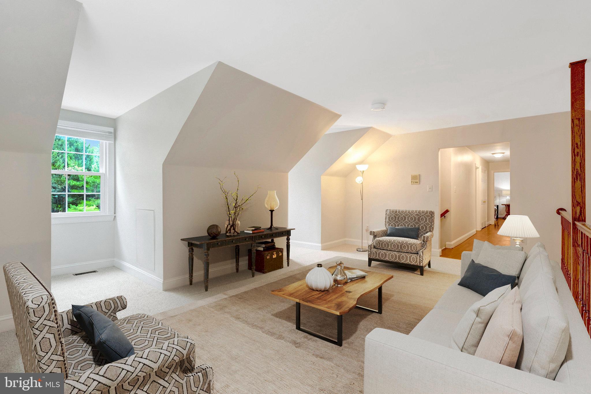 11181 Longwood Grove Drive Reston, VA 20194 - Photo 36 of 94 a living room with furniture and a large window