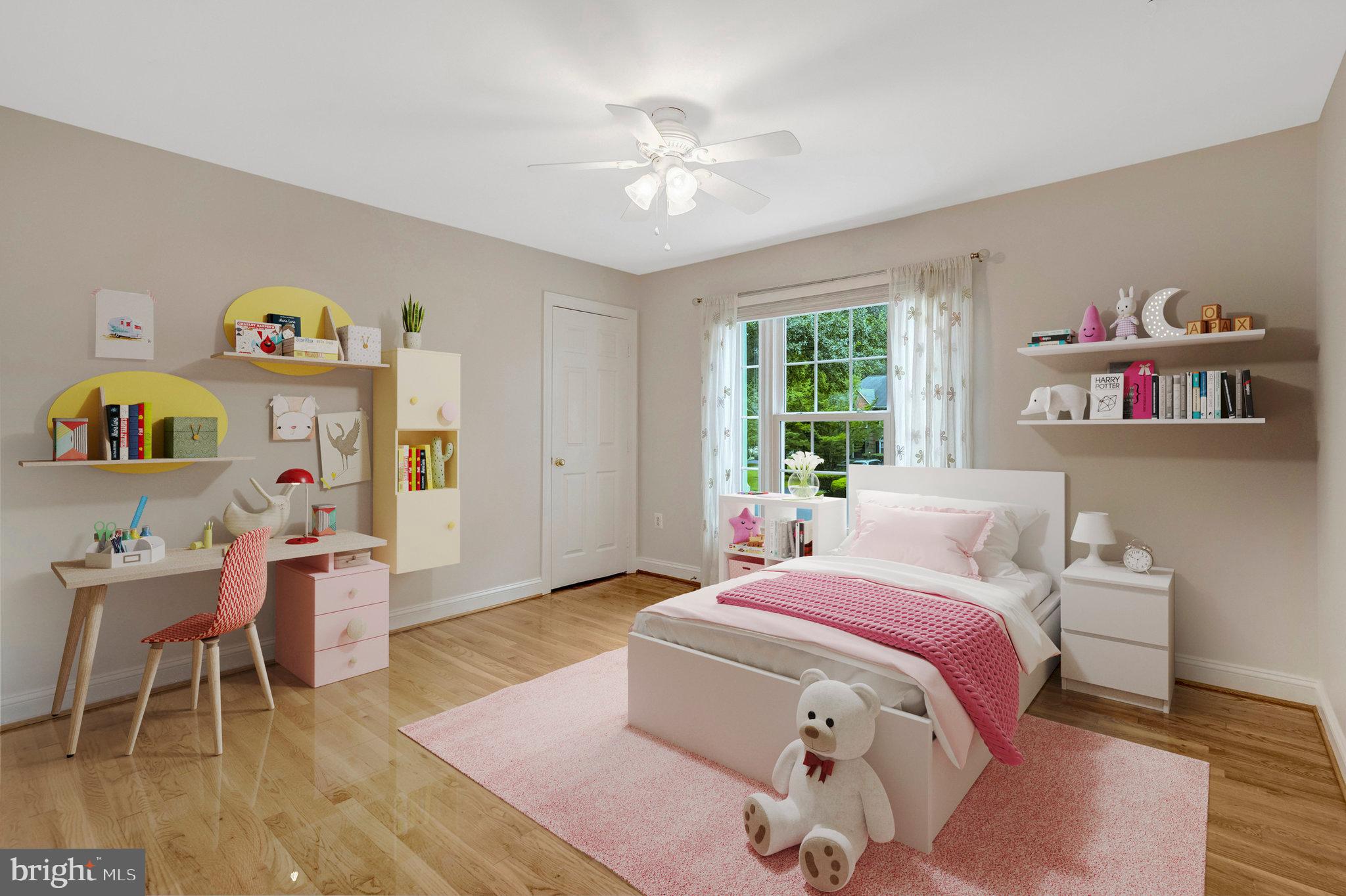11181 Longwood Grove Drive Reston, VA 20194 - Photo 53 of 94 a bedroom with a bed and a chandelier