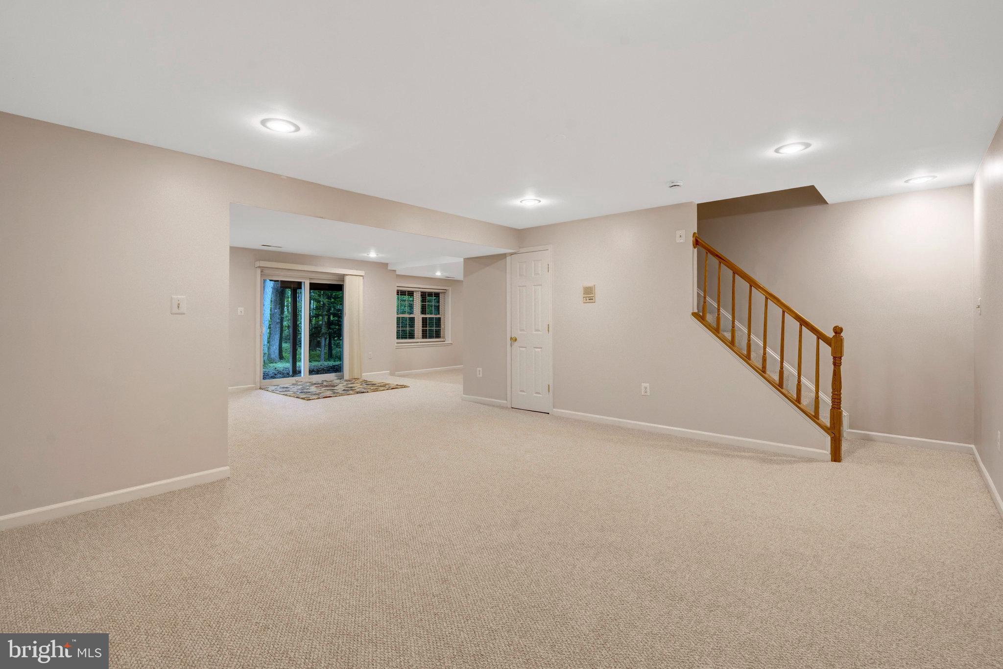 11181 Longwood Grove Drive Reston, VA 20194 - Photo 62 of 94 a view of an empty room with wooden floor