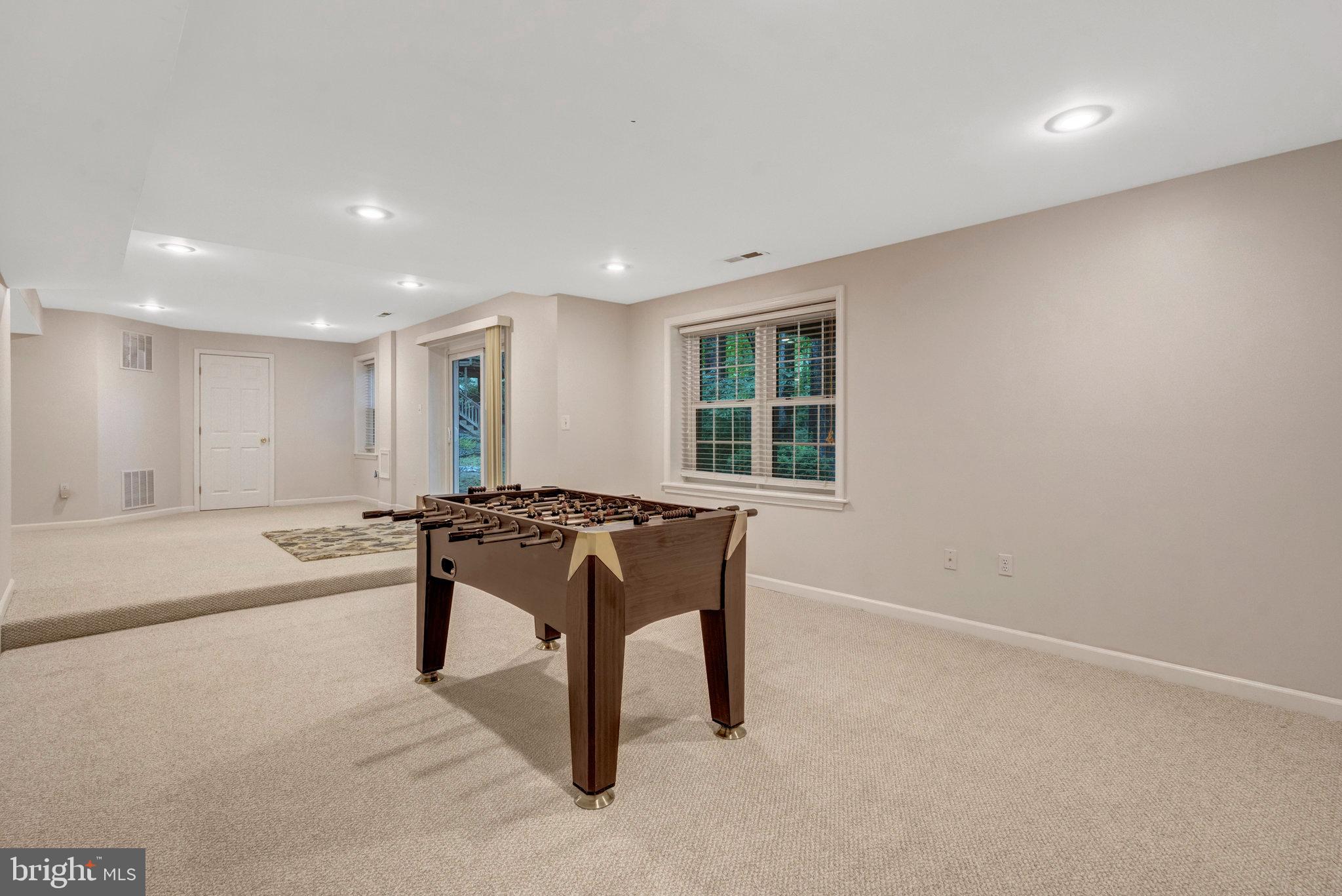 11181 Longwood Grove Drive Reston, VA 20194 - Photo 67 of 94 Spacious game room with natural light.