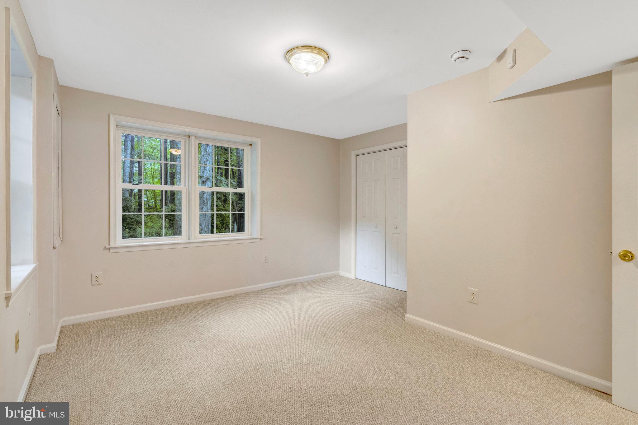 11181 Longwood Grove Drive Reston, VA 20194 - Photo 71 of 94 a view of an empty room with a window