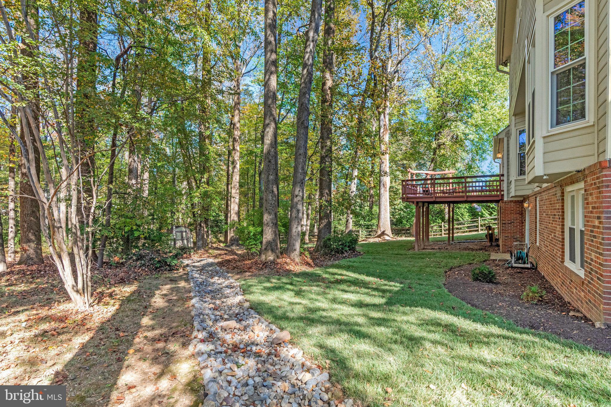 11181 Longwood Grove Drive Reston, VA 20194 - Photo 83 of 94 Serene backyard oasis with wooded backdrop.