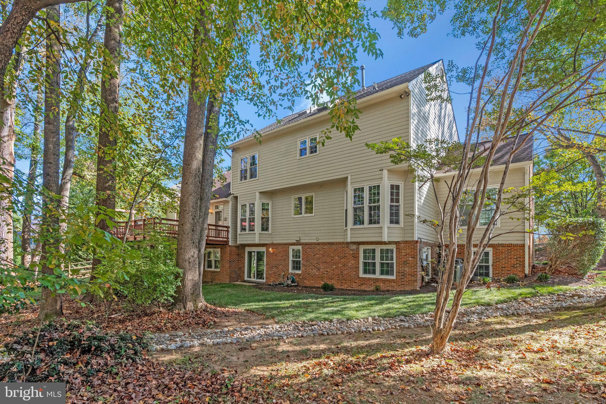 11181 Longwood Grove Drive Reston, VA 20194 - Photo 87 of 94 a view of a house with a yard