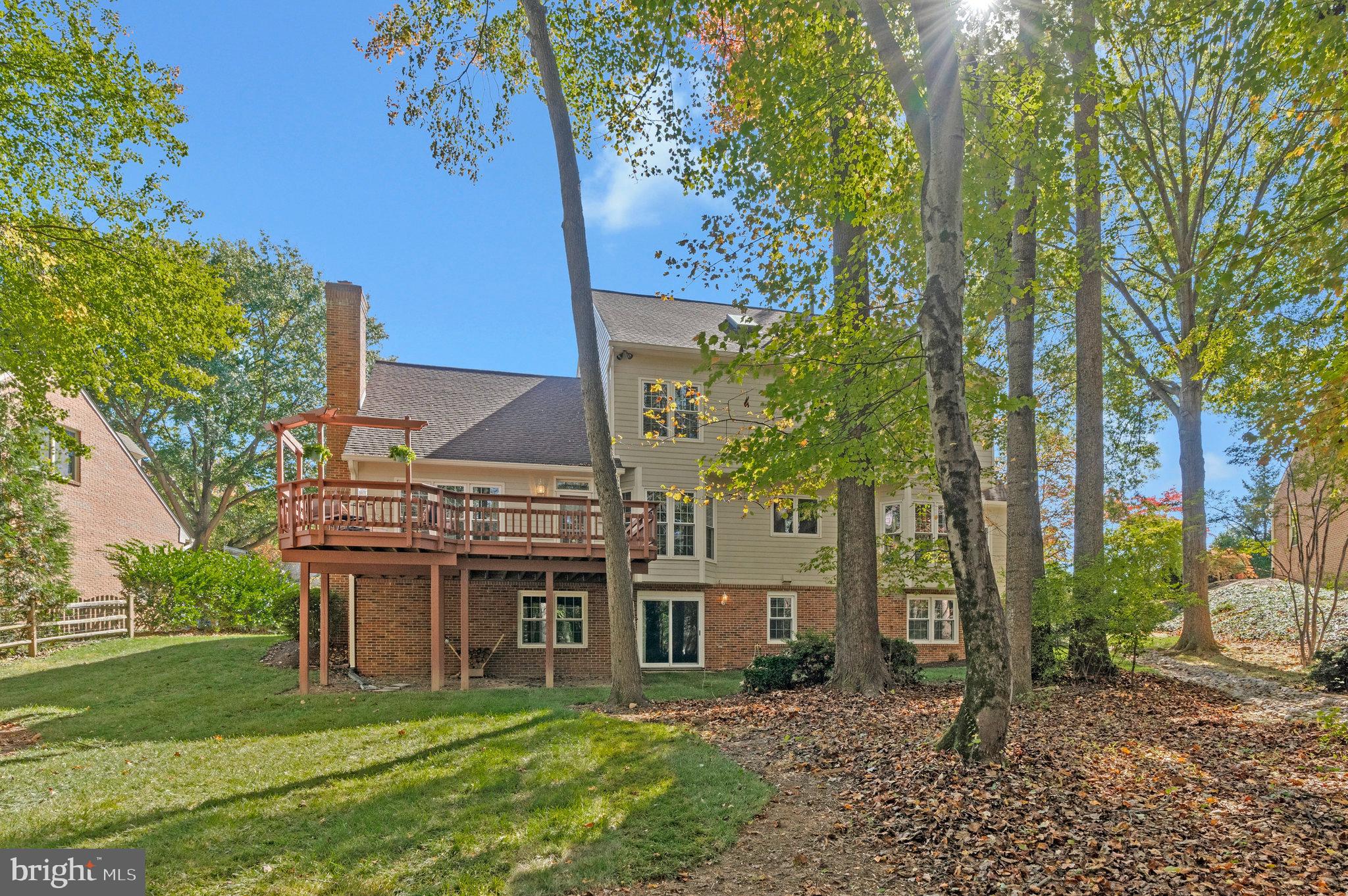 11181 Longwood Grove Drive Reston, VA 20194 - Photo 88 of 94 Charming home nestled among vibrant trees.