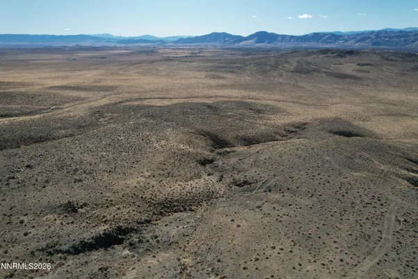 a view of an outdoor space with mountain view