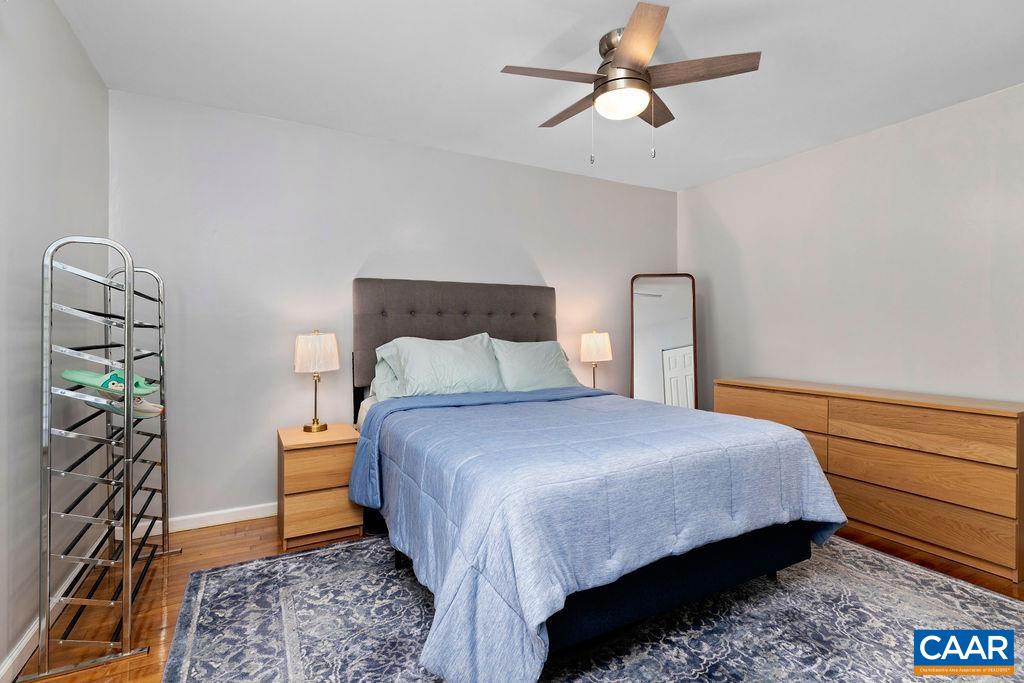 114 Hessian Hills Ridge, Unit 1 Charlottesville, VA 22901 - Photo 13 of 20 a bedroom with a bed dresser and a window