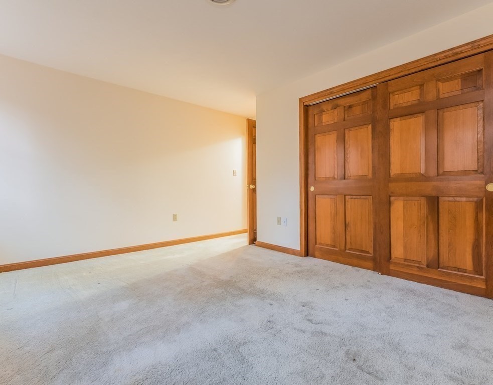 4 Uplands Road Littleton, MA 01460 - Photo 30 of 39 an empty room with a empty space and windows