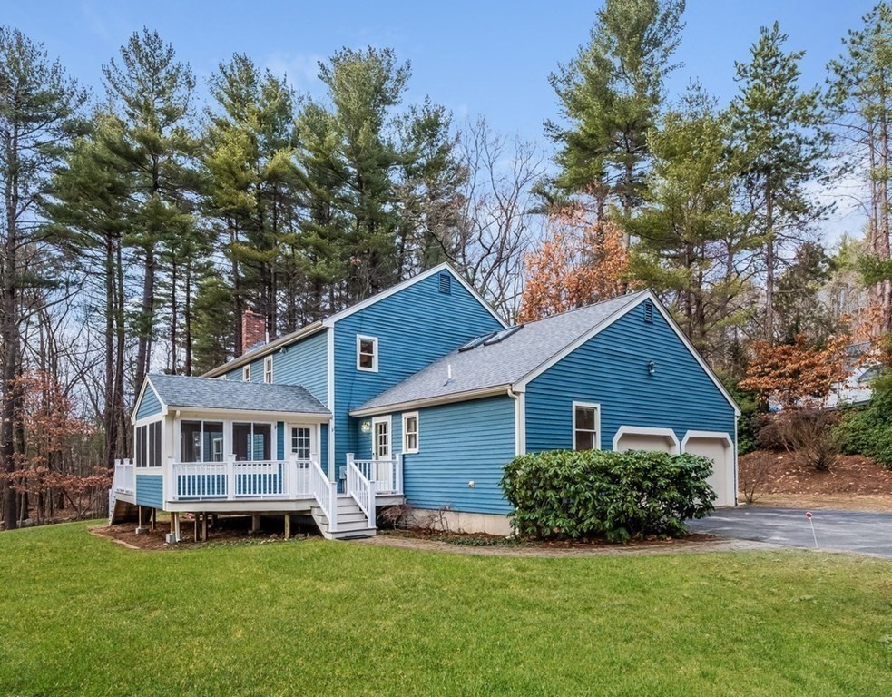 4 Uplands Road Littleton, MA 01460 - Photo 4 of 39 a view of a house with a yard