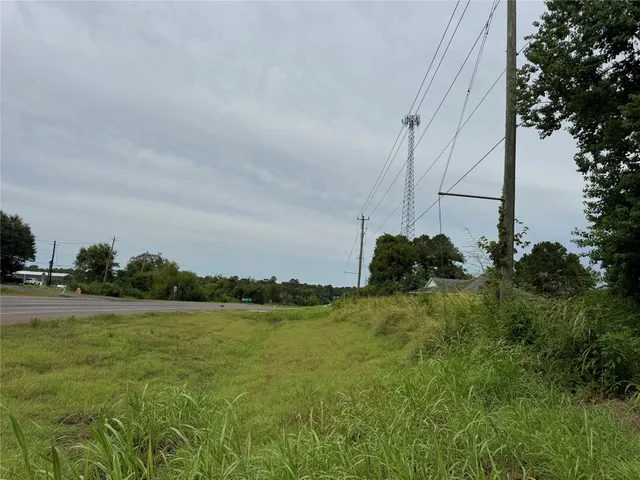 a view of a lake with a big yard